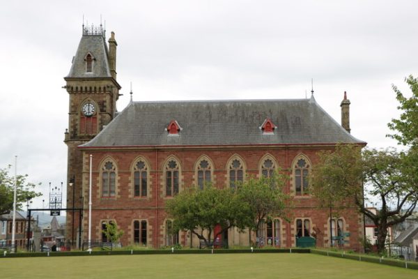 Photo of Large Victorian Court building with clock tower